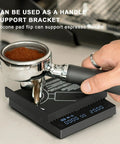 Ultra Slim Mini Coffee Scale With Timer For Espresso And Baking, showing hand holding portafilter on black digital scale