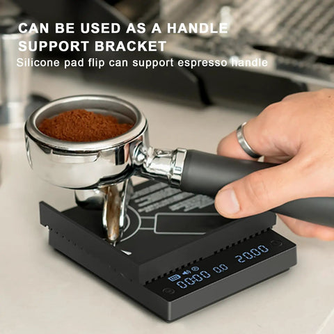 Ultra Slim Mini Coffee Scale With Timer For Espresso And Baking, showing hand holding portafilter on black digital scale