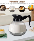 Universal Coffee Pot Replacement Carafe with tight fit spout and black grip on a kitchen counter