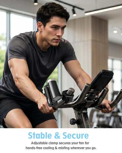 Top Shelf Adjustable Fan Clamp Attachment For Shark ChillPill 3 In 1 Cooling Fan mounted on exercise bike for hands-free use.