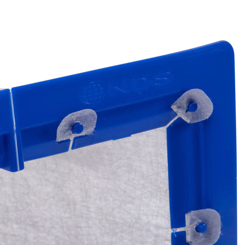 Close-up of plastic and geotextile Square Catch Basin Drain Filter For No Clog Drainage Systems, edge detail shown.