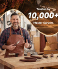 Man with apron holding knife from Wood Carving Kit 30 Piece Tools Set With Leather Storage Bag Slick Deluxe Whittling Kit