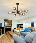 8 Light Chandelier Pendant Lighting Black With Glass Globes Dope Vintage Sputnik Ceiling Light Fixture in living room setting