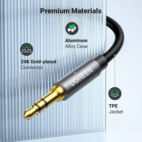 Close-up of Premium 3.5 Mm Aux Extension Cable Three Pole Trs Headphone Extender Cord 3.3 Feet with gold-plated connector.