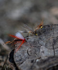 Close-up of hand-tied nymph and streamer flies on wood from 30 Piece Fly Fishing Lure Kit Hand Tied Dry Wet Streamers And Nymph Flies
