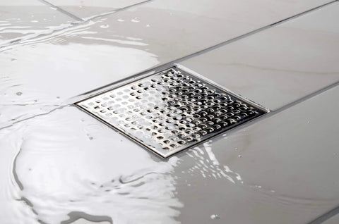 4x4 Inch Square Shower Drain Grate Built In Stainless Steel That Is Corrosion Resistant And Features A Self Cleansing Sloped Channel
