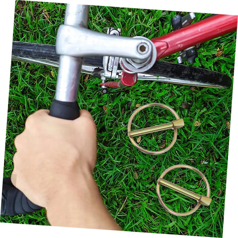 Heavy Duty Lynch Pin Kit With Locking Clips For Trailers Tractors And Mowers Quick Release Design For Easy Maintenance And Safe Operation Three Sixteenth Inch Pins For Trucks Agricultural And Industrial Use, shown on mower hitch
