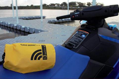 All In One Boating Safety Dry Bag Kit With IP68 Waterproof Flashlight on watercraft dock