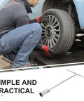Heavy Duty T Handle Socket Wrench Set Featuring Rock Solid Steel Lug Nut Ratchet Tool Hella Durable Autowork Gear Designed For Grease Monkeys And Effortless DIY Projects Under Any Hood Today, man using wrench on car wheel.