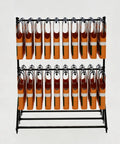 Sturdy Built Tough Heavy Duty Life Vest Organizer Rack With Smooth Rolling Swivel Wheels For Poolside Deck Storage Two Tier Water Safety Display Rack holding multiple life vests.