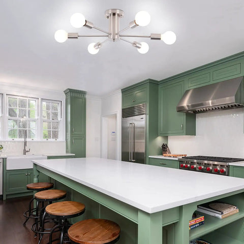 Six Light Nickel Sputnik Ceiling Chandelier With Mid Century Style in modern kitchen above island with green cabinetry.