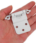 Four Pack White Powder Coated Iron Cabinet Hinges That Self Close No Slam Soft Close For Kitchen Cupboard Doors Replacement Hardware For Quiet Durable Door Action in hand