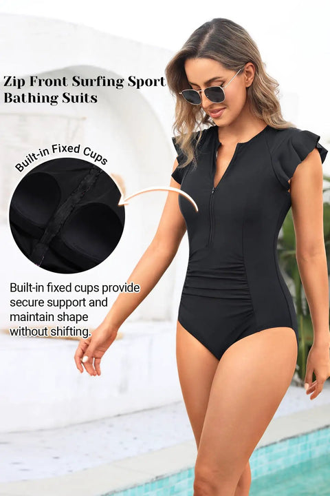 Black Zip Front One Piece Swimsuit With Rash Guard Short Sleeve For Women Built In Padded Bra Tummy Control Surfing And Water Sports Bathing Suit For All Day Beach Vibes showing built-in fixed cups