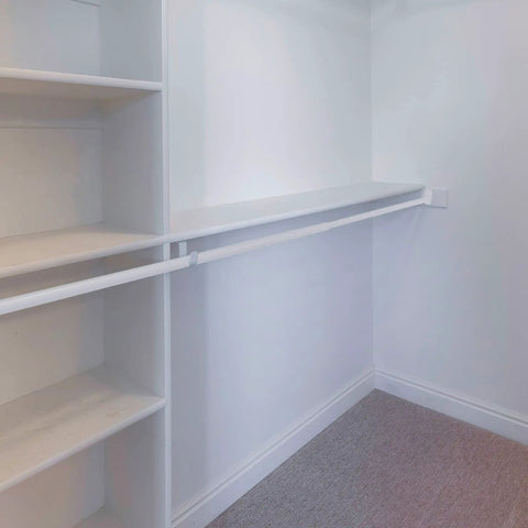 Adjustable Closet Rod 48 To 72 Inches White, Heavy Duty Steel Construction, Easy Install For Quick Closet Makeover displayed in closet