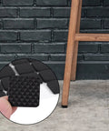 48 Pack Black Rubber Feet Pads Non Slip Floor Protectors for furniture and appliances, showing pad texture and use on chair leg.