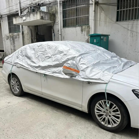 Top Tier Waterproof Car Cover Keeps Your Tesla Cybertruck Whip Looking Sharp And Safe From Road Grime Daily Weather And Sun Damage With A Heavy Canvas Shield And Tight Seal on a white car.