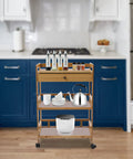 Heavy Duty Rolling Kitchen Cart With Drawer, Three Tier Bamboo Utility Island For Microwave And Coffee Station with kitchen items.