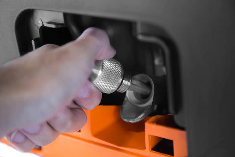 Hand inserting Magnetic Oil Dipstick For Inverter Generators With Industrial Strength Magnetic Tip Keeps Metal Shavings Out Of Oil
