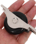 Premium Heavy Duty Nylon Sliding Door Rollers And Closet Track Pulleys in hand showcasing durable black wheel and metal hinge.