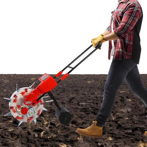 Person using Hand Push Roller Seeder Manual Seeder Machine Walk Behind Row Crop Planter with five mouths on field