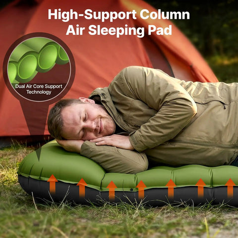 Man sleeping on Ultralight Inflatable Sleeping Pad With Built In Pillow And Foot Pump For Camping, 6 Inch Thick, in green, near tent.
