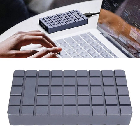 No Sweat M2 NVMe SSD Enclosure Rugged Aluminum USB4 External Drive Case on laptop with dual thermal paste for fast transfers.