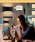 Straight Up Modern Matte Black LED Wall Sconces Set Of Two Hardwired Fixtures With 3000K Warm White Glow illuminating a workspace.