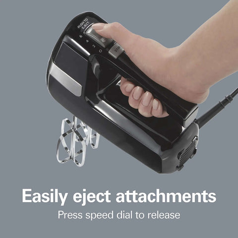 Slick Electric Hand Mixer Packing Six Speeds Plus A Dedicated Stir Button To Dodge Splatter While Whipping Up Thick Dough Or Fluffy Batter Plus Dual Beaters And Heavy Duty Hook Attachments, showing the eject button feature.