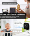 2K Indoor Security Camera For Baby And Pet Monitor With Motion Detection, 2 Way Audio, Siren, Night Vision next to a baby in a crib