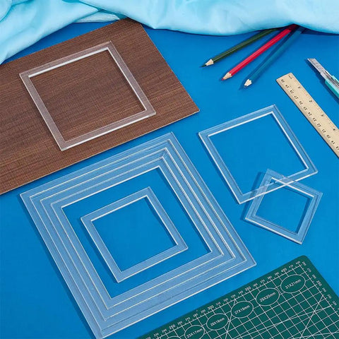 Top Shelf Set Of Eight Square Router Templates For Woodworking Projects Tough Clear Acrylic Tracing Jigs From Two Point Nine To Eight Inches arranged with colored pencils and a ruler.