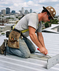 Worker using 15 Inch Sheet Metal Bender Tool For HVAC Ductwork And Standing Seam Roofing Panels on rooftop