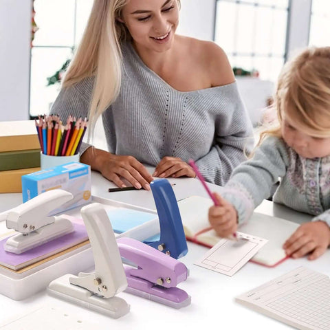 Mother and child using a Single Hole Punch For Crafts And Scrapbooks With 40 Sheets Punch Capacity Non Slip Removable Base