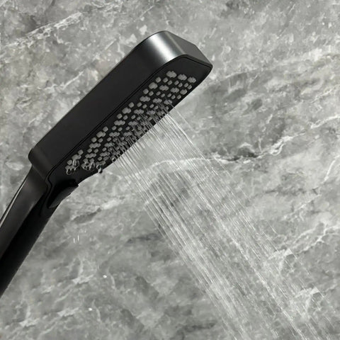 Upgrade Your Bathroom with This Matte Black Handheld Shower System - Adjustable Slide Bar & Hose High-Pressure Spray Easy-Clean Silicone Nozzles, close-up of spray nozzle.