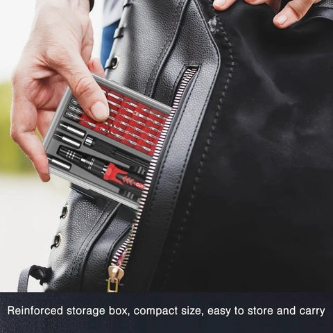 Person placing 61 In 1 Precision Screwdriver Kit With 57 Bits And Flexible Shaft Extension in a black bag