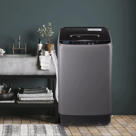 Compact Full Automatic Washing Machine In Sleek Grey Acts As A Smooth Operator With Quick Wash Spin Cycles And Direct Drainage.