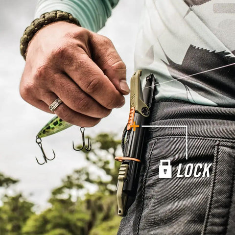 LineDriver Fishing Multitool 6 In 1 Line Vise Hook Threader Scissors Split Shot Crimper attached to person's pocket