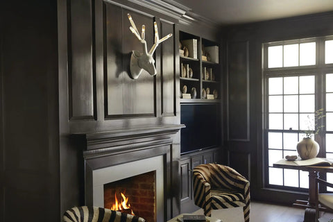 Oversized Six Light Wall Sconce In Matte Charcoal Painted Finish Killer Lodge Style Decor For Big Time Dining Room Glow and Game Changing Rustic Home Accents above fireplace.