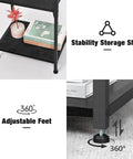 Close-up of tall nightstand with charging station, showing stability shelf and adjustable feet, black finish, compact design.