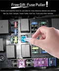 Hand using fuse puller on car fuse box with All In One Car Fuses Assortment Kit 250 Piece With Standard And Mini Blade Fuses