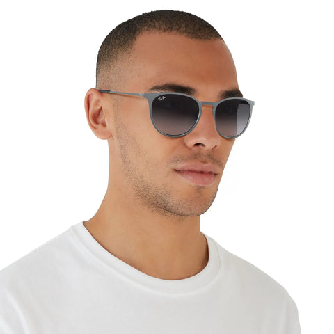 Man wearing Erika Metal Round Sunglasses Unisex Design For Men And Women, Lightweight Frame With Keyhole Bridge, Metallic Gray To Dark Gray Gradient Lenses, 54 mm Narrow Fit, Everyday Dope Eyewear