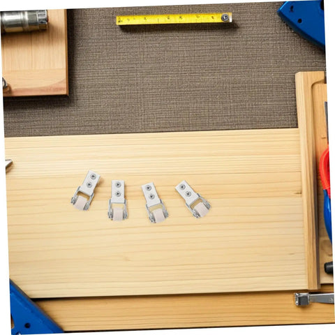 6 Pack Rock Solid Sliding Door Rollers With Galvanized Nylon Tracks For Cabinets And Furniture on a wooden surface with tools.