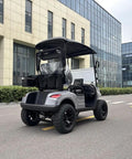 Dual Lithium Golf Carts With Built In Cup Holders Keeping Drinks Chilled Featuring Lightweight Electric Setup rear view in urban setting.