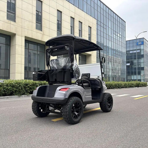 Dual Lithium Golf Carts With Built In Cup Holders Keeping Drinks Chilled Featuring Lightweight Electric Setup rear view in urban setting.