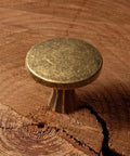 Antique Brass Cabinet Knobs Zinc Alloy 6 Pack Vintage Drawer Knobs And Pulls Single Hole Dresser Handle on wood surface