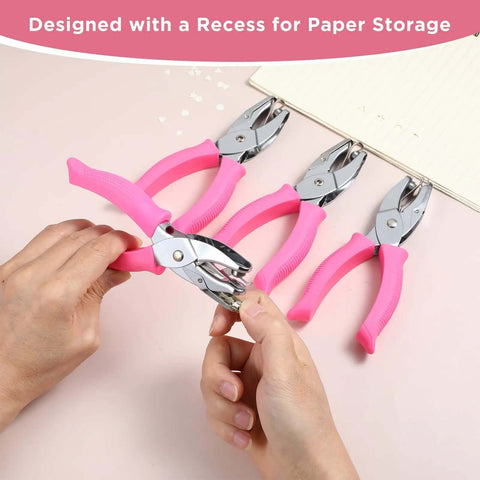 Grab And Go Four Piece One Quarter Inch Hole Punch Set With Circle Heart Star Triangle Shapes And Soft Grip Handles being used on paper
