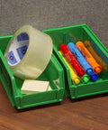 Green stackable plastic storage bins holding office supplies, similar size to Blue Stackable Plastic Storage Bins 7x4x3 Inch.
