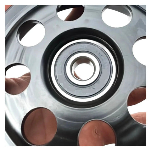 Smooth Drive Serpentine Idler Pulley That Fits Subaru Cars showing central bearing and perforated design for enhanced stability.