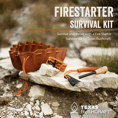 Bushcraft Fire Starter Survival Kit with ferro rod, striker, leather tinder bag, paracord bracelet on outdoor stone surface