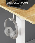 One Piece Standing Desk With Electric Height Adjustment For Sit Stand Comfort, 40 By 24 Inches, featuring side storage hooks