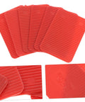 100 Pcs Plastic Door Frame Shims For Windows And Doors, red wedges, composite material, close-up view.